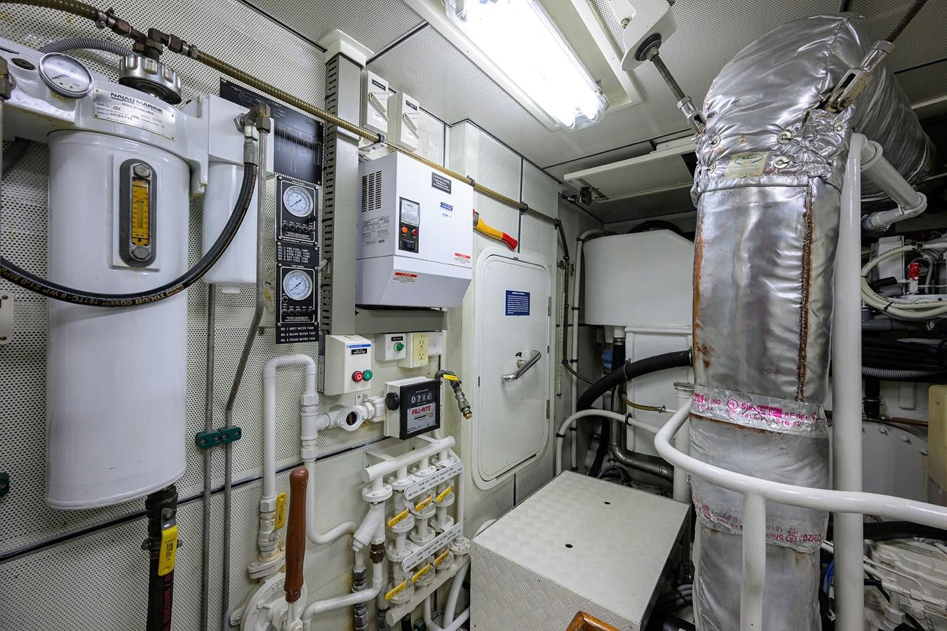 a room with white pipes and equipment aboard ST. TROPEZ Yacht for Sale