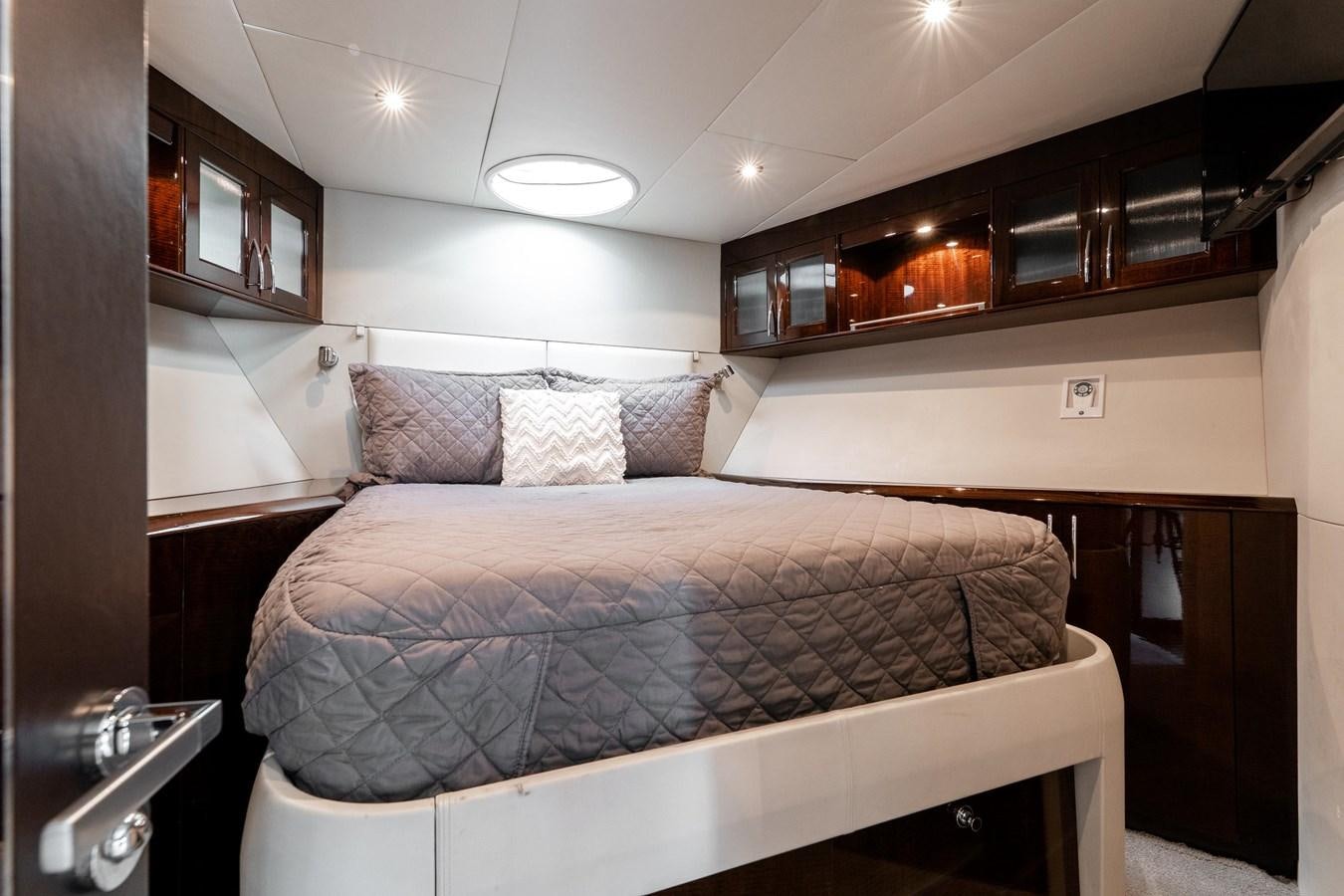 a bed in a room aboard SALACIA Yacht for Sale