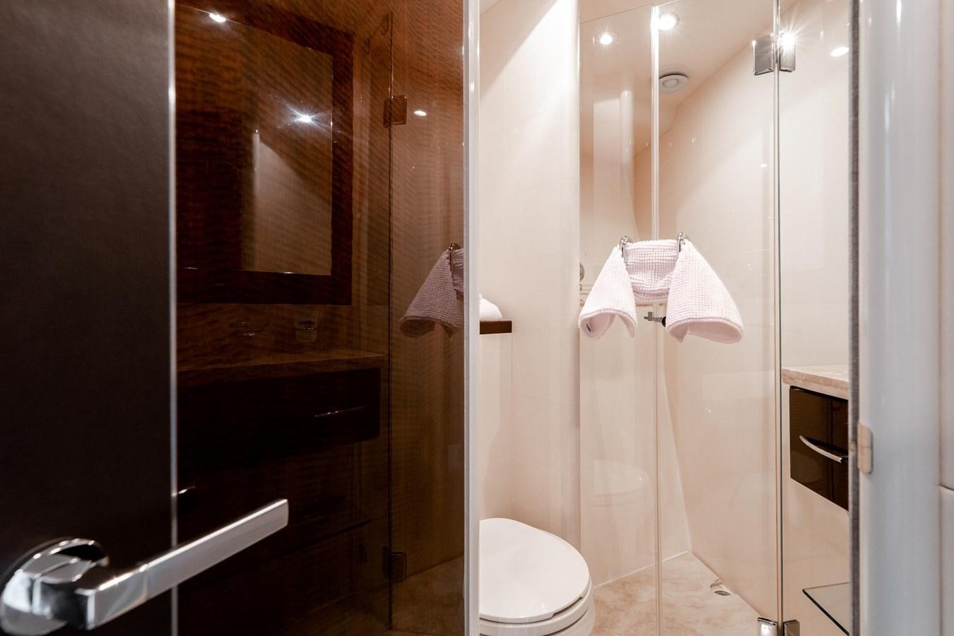 a bathroom with a standup shower aboard SALACIA Yacht for Sale
