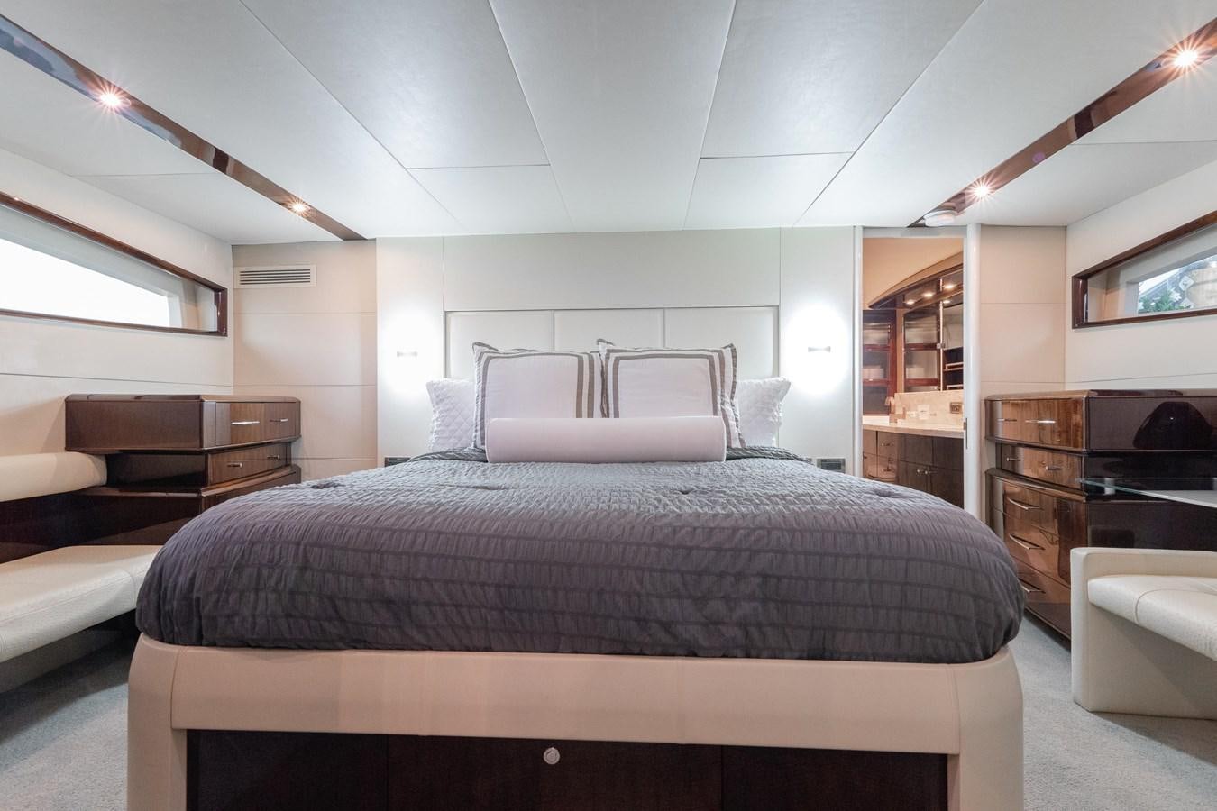 a bed in a room aboard SALACIA Yacht for Sale