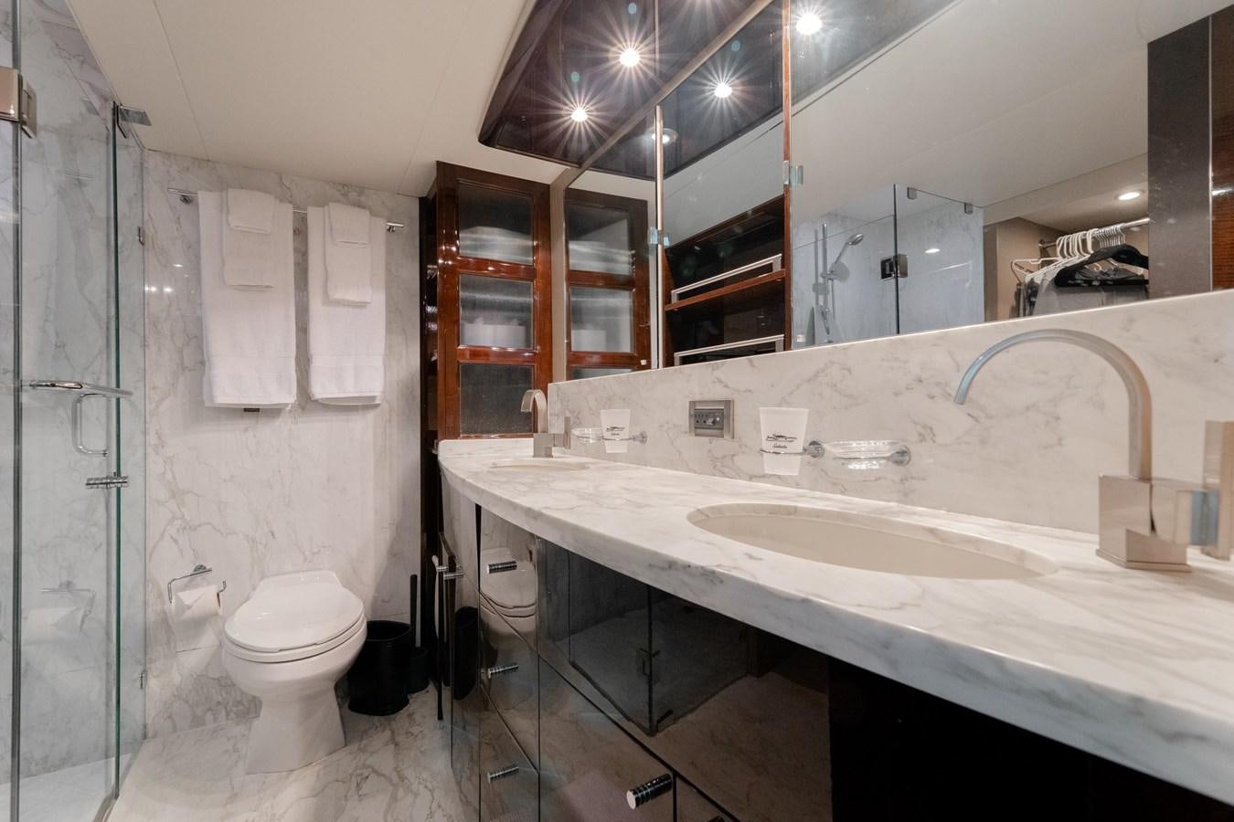 a bathroom with a sink and a toilet aboard SALACIA Yacht for Sale