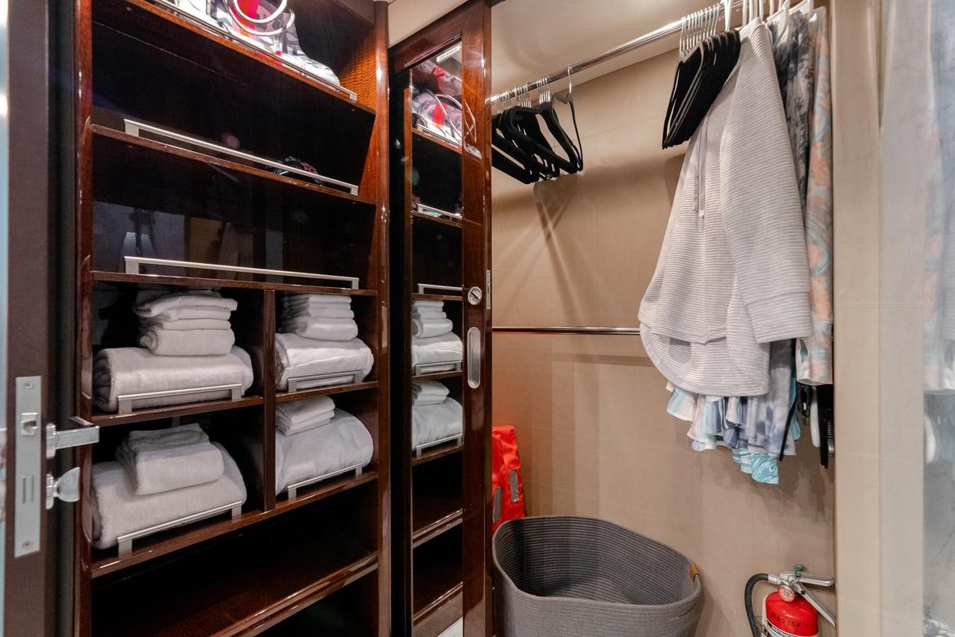 a closet full of folded towels aboard SALACIA Yacht for Sale