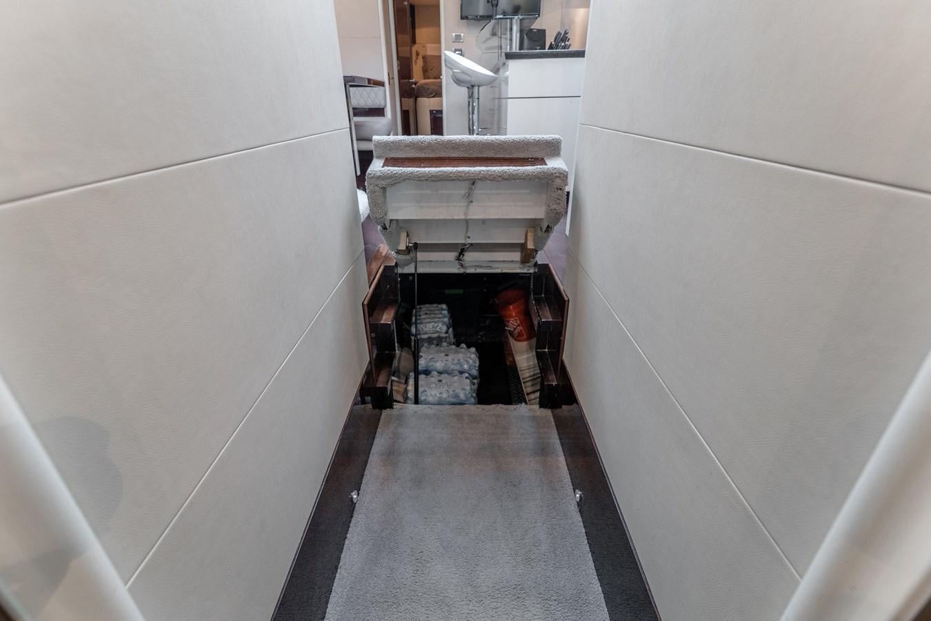 a person standing in a doorway aboard SALACIA Yacht for Sale