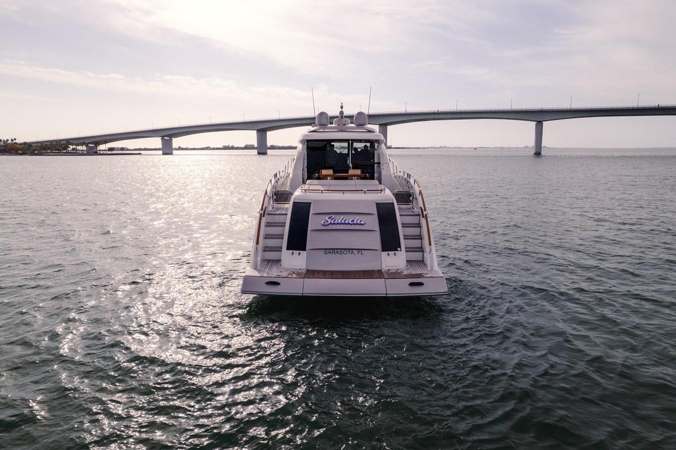 a boat sailing on the water aboard SALACIA Yacht for Sale