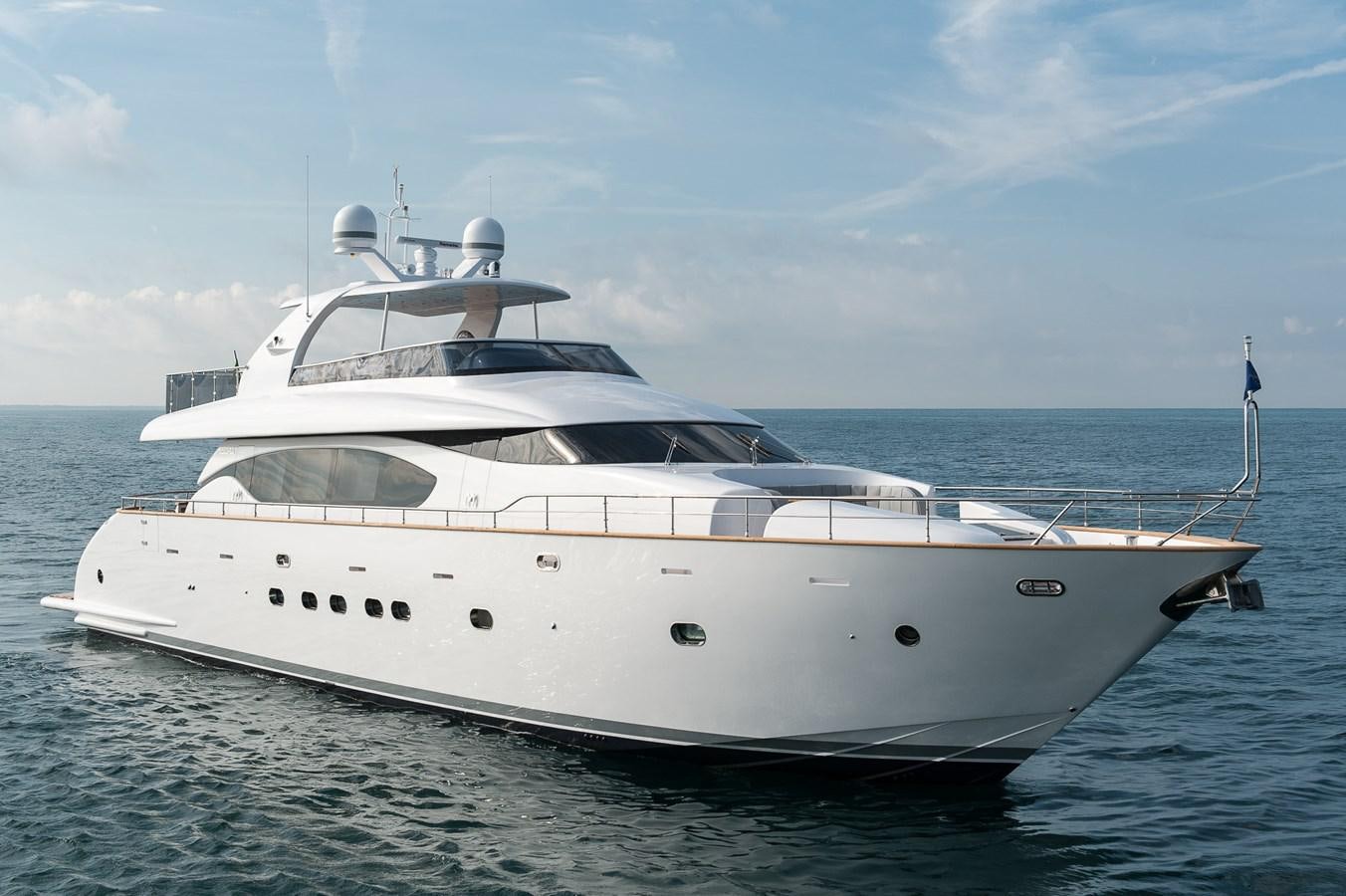a white yacht in the water aboard MIREDO Yacht for Sale
