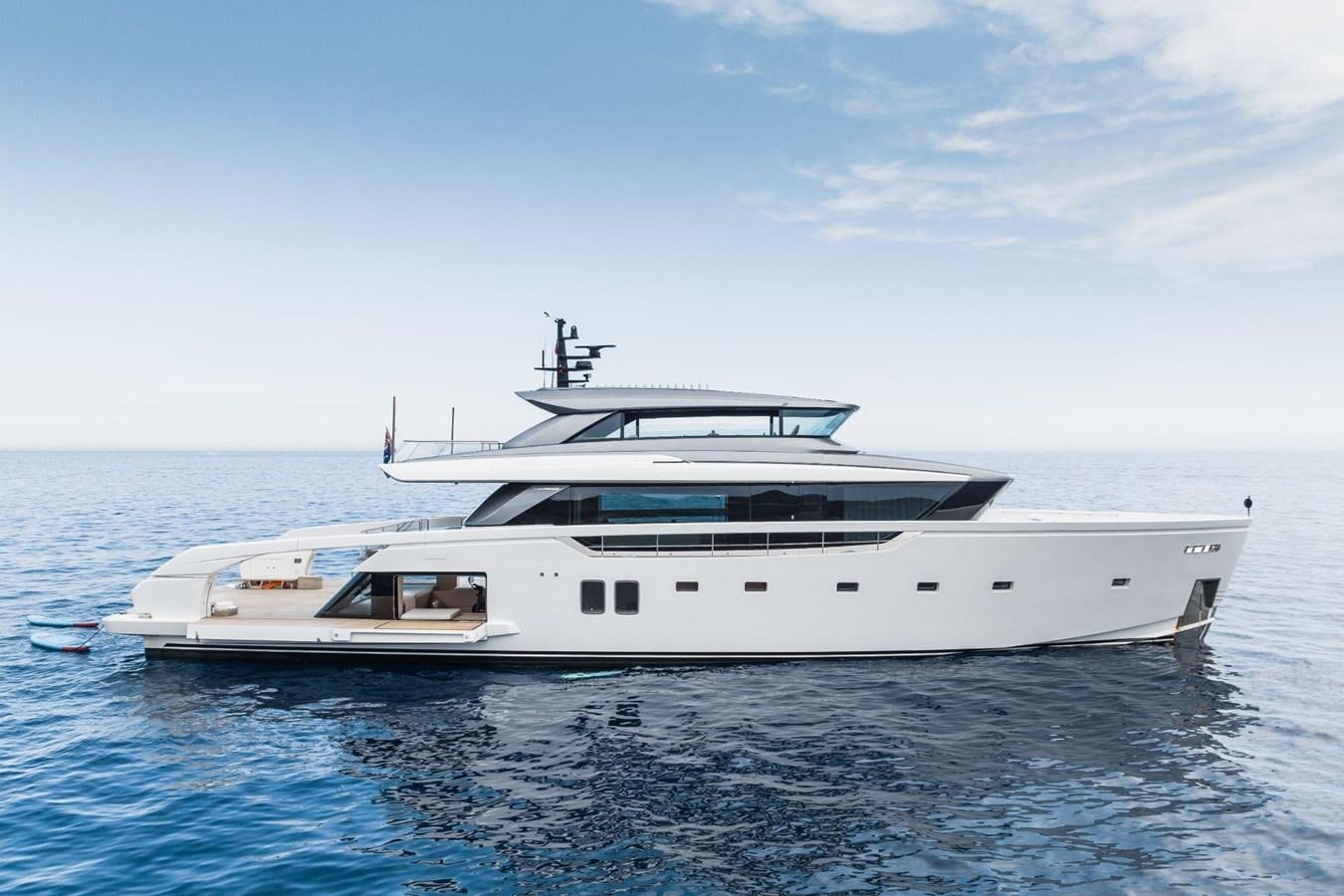a white yacht in the water aboard AMI Yacht for Sale