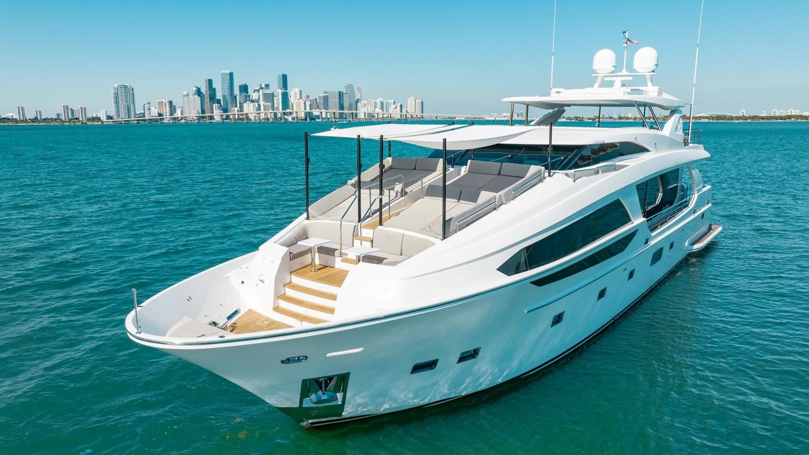 a white yacht on the water aboard ADAGIO Yacht for Sale