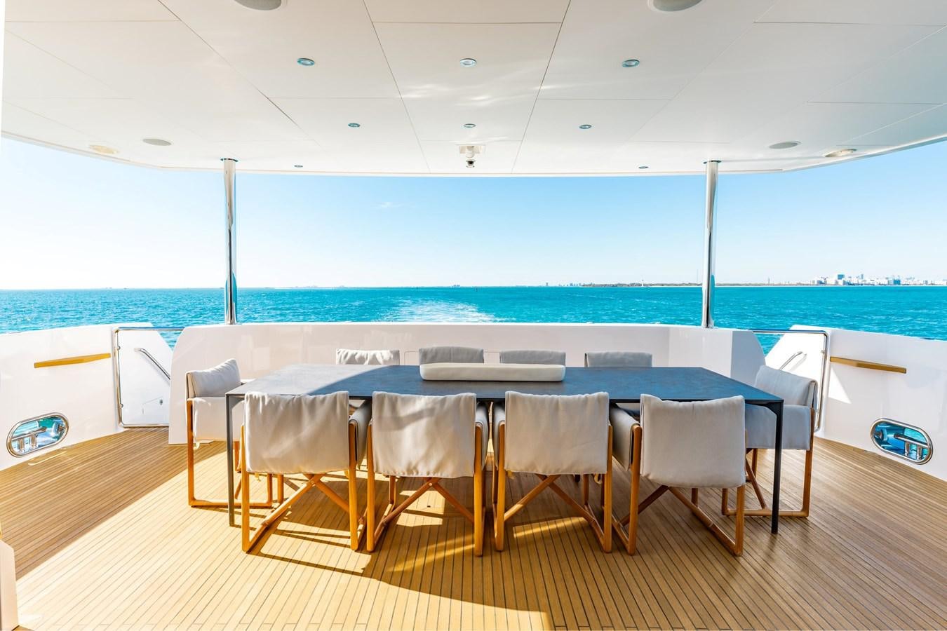 a table set for a dinner party aboard ADAGIO Yacht for Sale