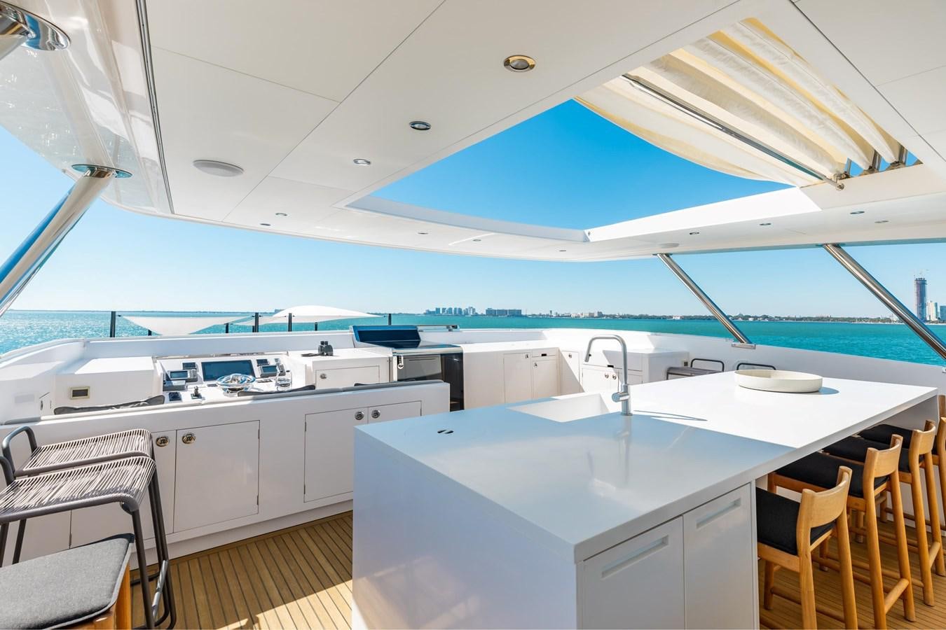 a kitchen with a large island aboard ADAGIO Yacht for Sale