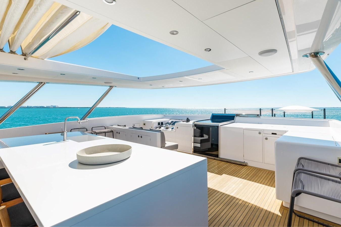 a kitchen with a large window aboard ADAGIO Yacht for Sale