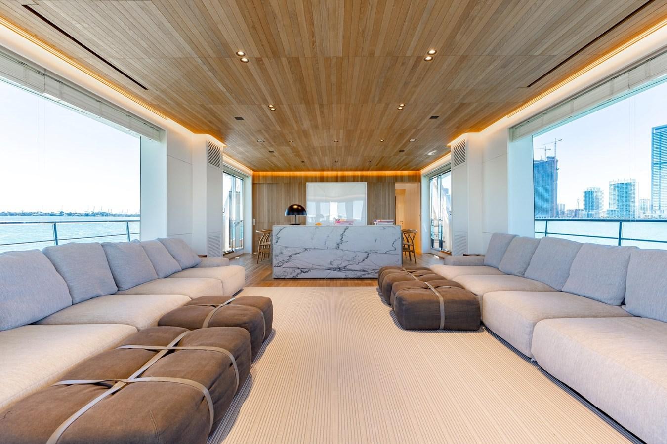 a living room with a large window aboard ADAGIO Yacht for Sale