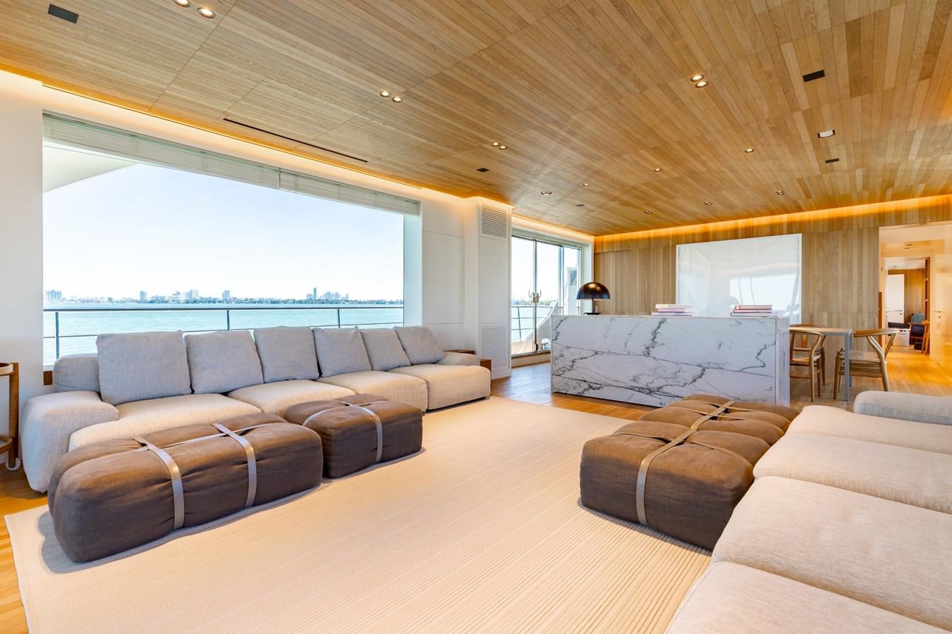 a living room with a large open window aboard ADAGIO Yacht for Sale