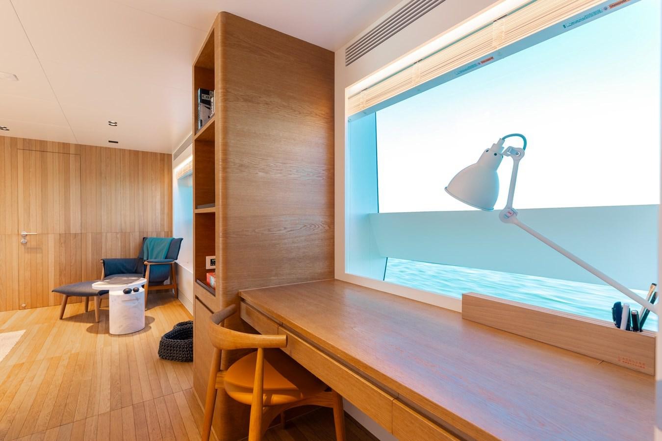 a room with a table and chairs aboard ADAGIO Yacht for Sale