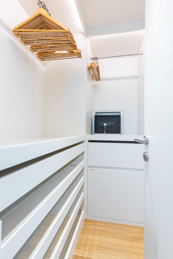 a white cabinet with a vent on it aboard ADAGIO Yacht for Sale