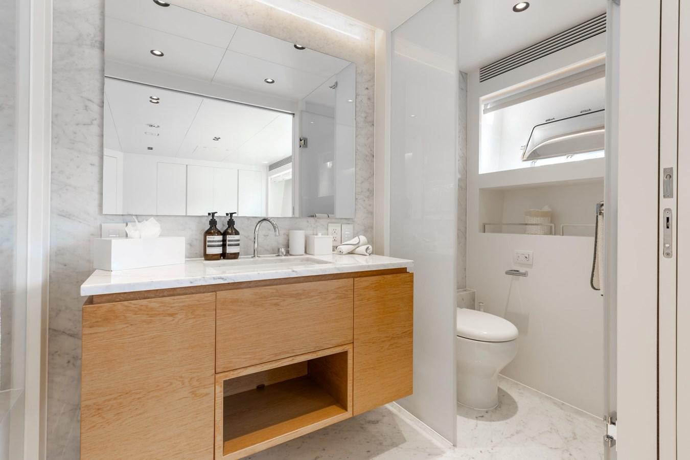 a bathroom with a sink and a toilet aboard ADAGIO Yacht for Sale