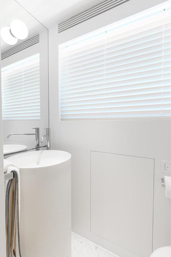 a bathroom with a sink and a mirror aboard ADAGIO Yacht for Sale