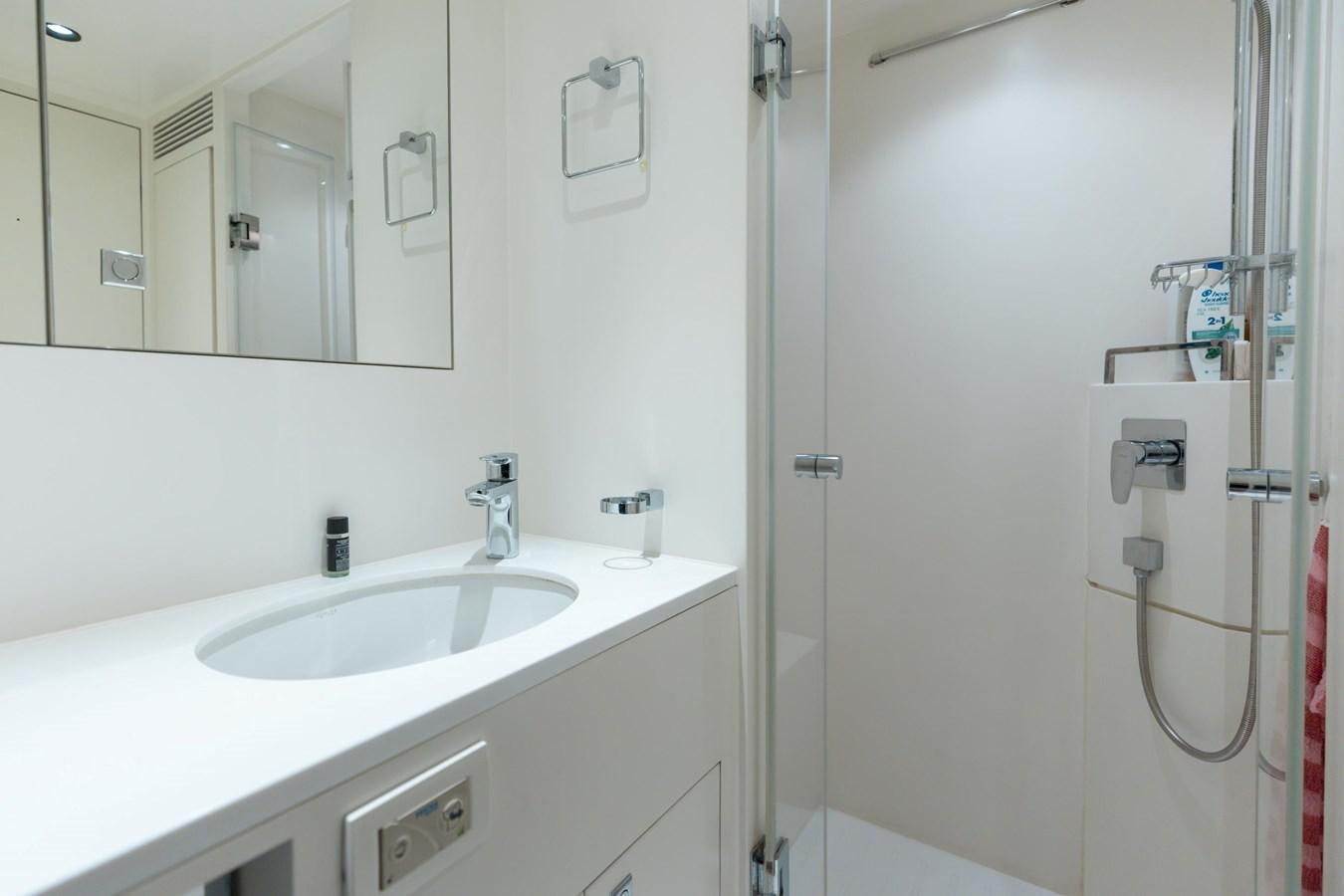 a bathroom with a sink and a mirror aboard ADAGIO Yacht for Sale