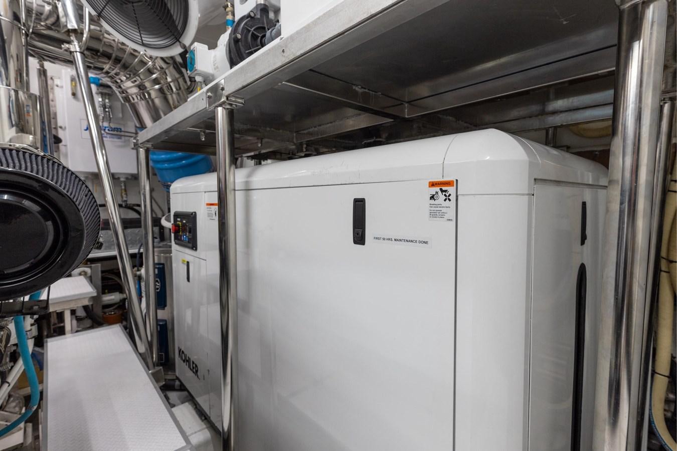 a large machine in a room aboard ADAGIO Yacht for Sale