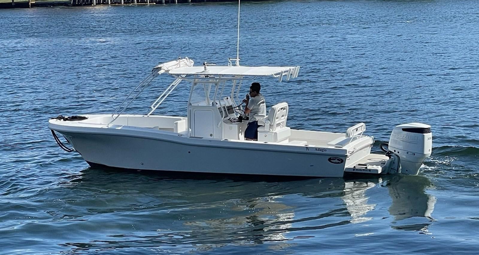 a person on a boat aboard ADAGIO Yacht for Sale