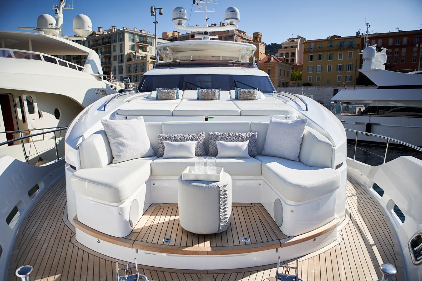 a white yacht on a deck aboard NADIRA Yacht for Sale