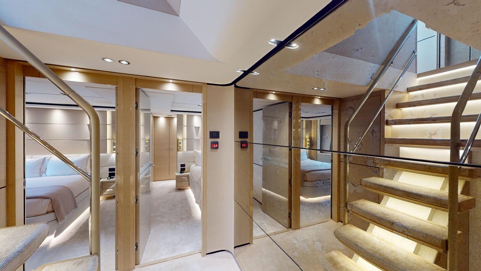 a room with a staircase and a glass door aboard NADIRA Yacht for Sale