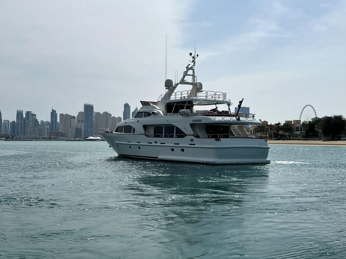 a white boat on the water aboard BENETTI 100 Yacht for Sale