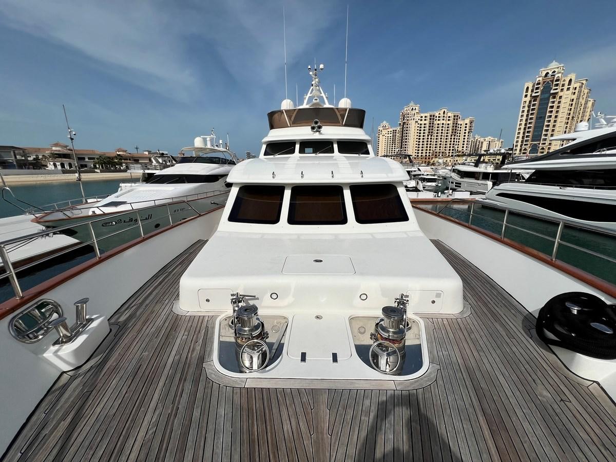 a boat in a harbor aboard BENETTI 100 Yacht for Sale