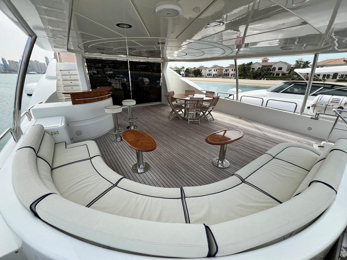 a boat with tables and chairs aboard BENETTI 100 Yacht for Sale