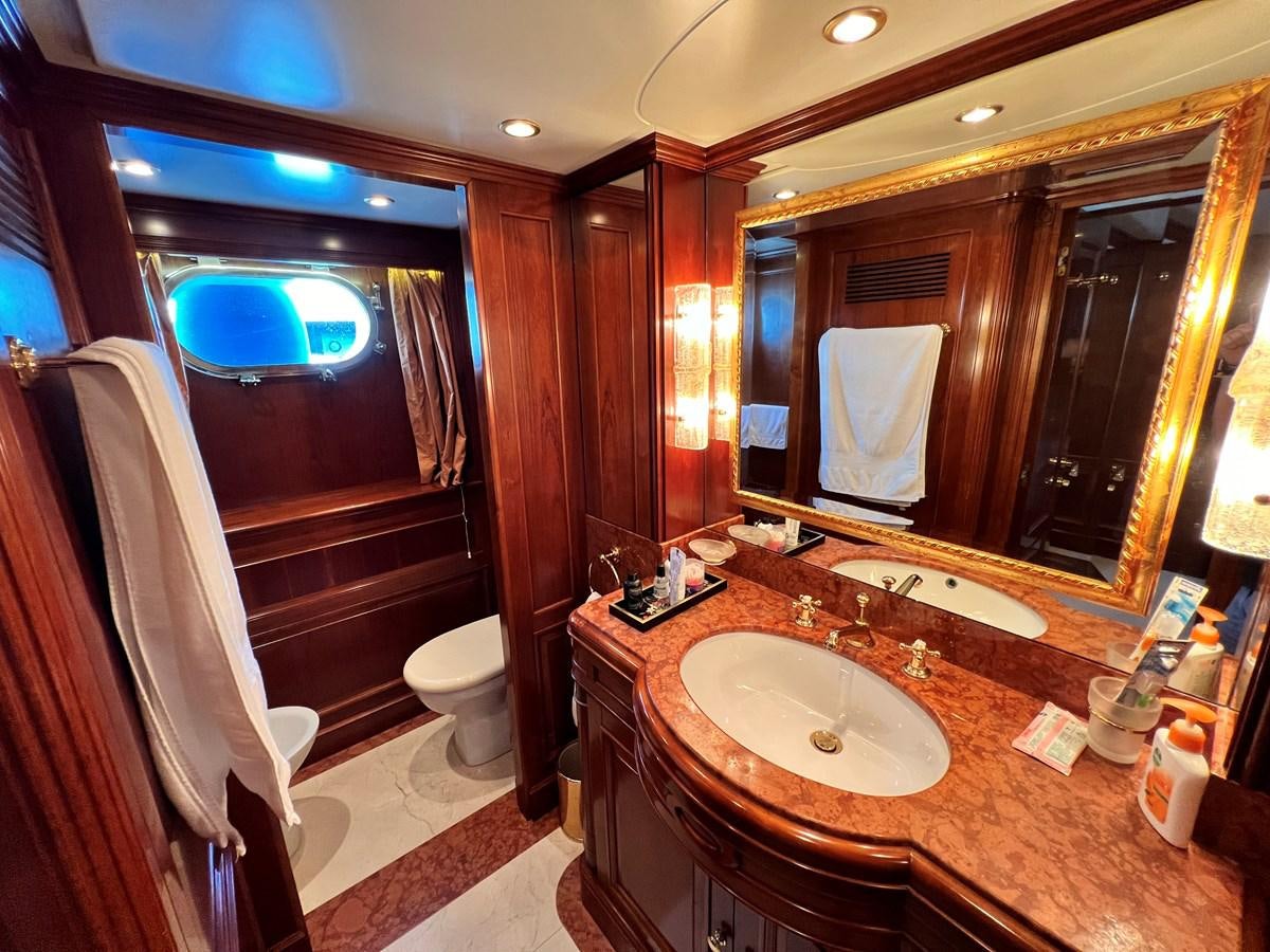 a bathroom with a sink and a toilet aboard BENETTI 100 Yacht for Sale