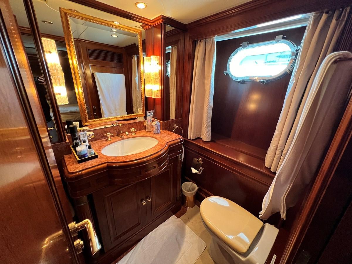a bathroom with a sink and a toilet aboard BENETTI 100 Yacht for Sale