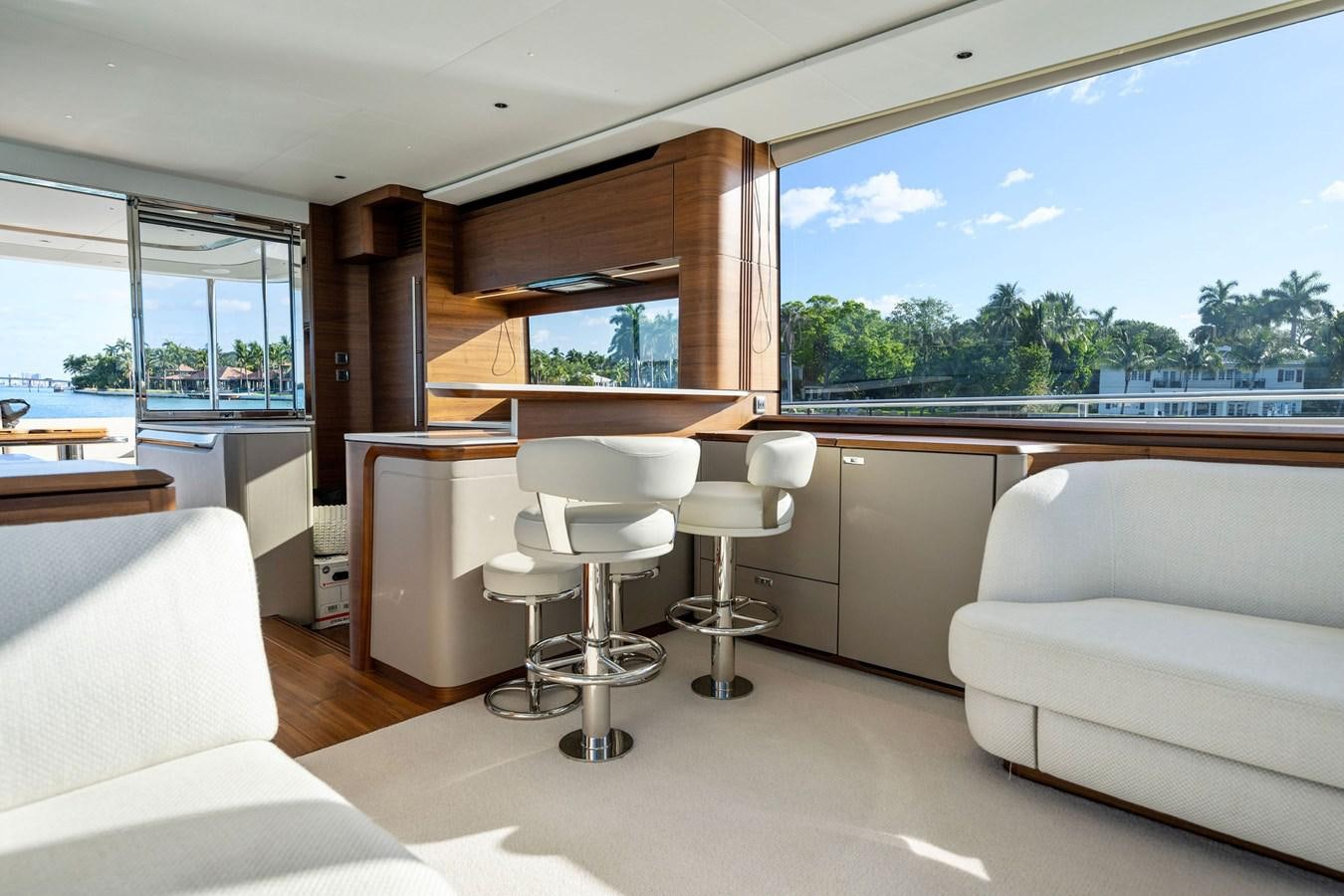 a room with a couch and a table and chairs aboard ELIZABETH Yacht for Sale