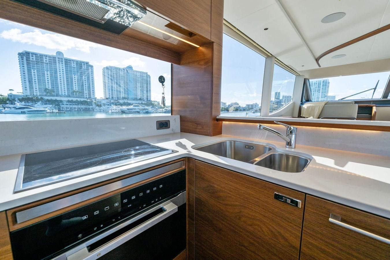 a kitchen with a sink and a window aboard ELIZABETH Yacht for Sale