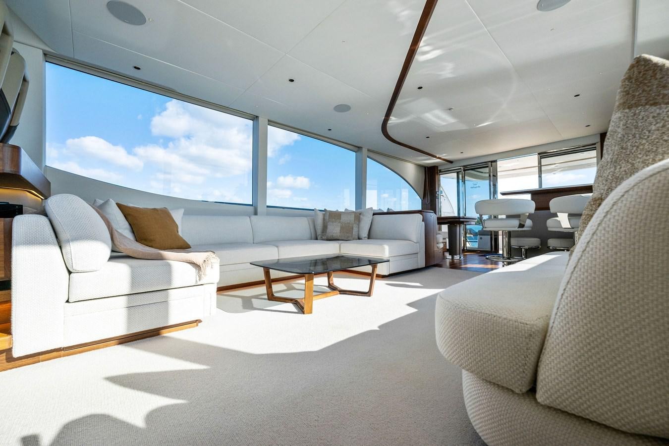 a room with a couch and a table and a tv aboard ELIZABETH Yacht for Sale