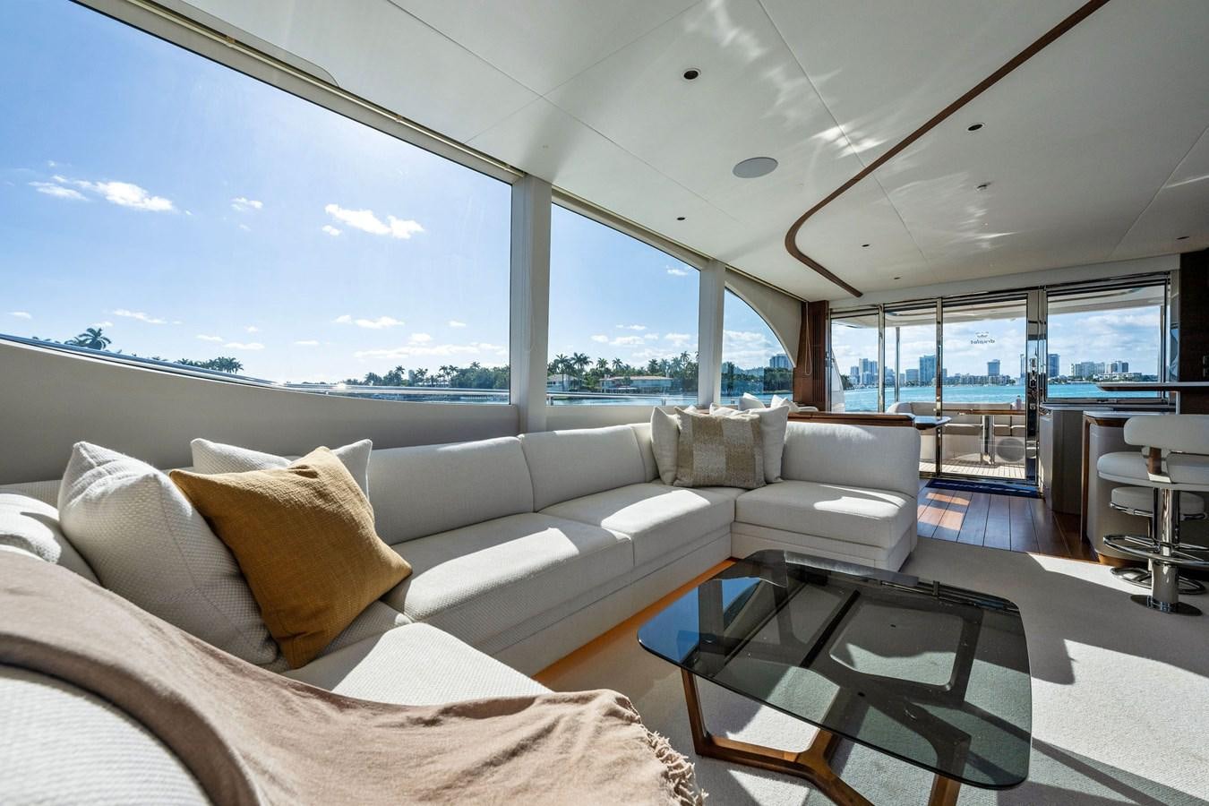 a living room with a large window aboard ELIZABETH Yacht for Sale