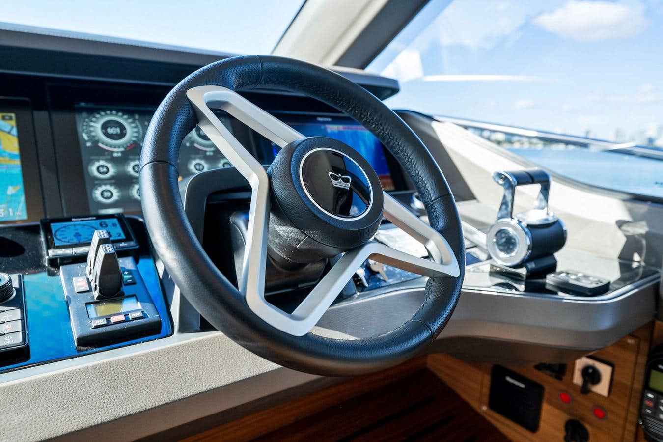 steering wheel and dashboard of a car aboard ELIZABETH Yacht for Sale