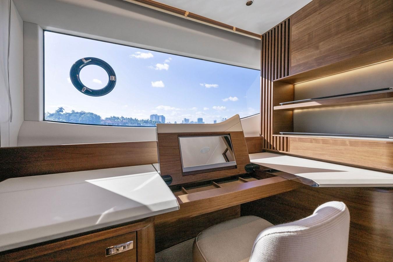 a room with a tv and a chair aboard ELIZABETH Yacht for Sale