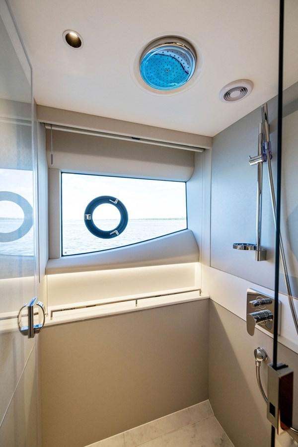 a room with a glass door and a window aboard ELIZABETH Yacht for Sale