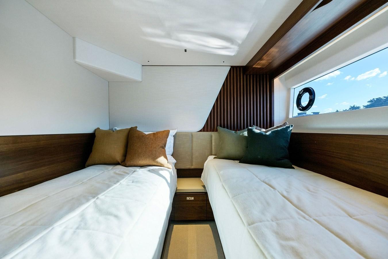 a room with two beds aboard ELIZABETH Yacht for Sale