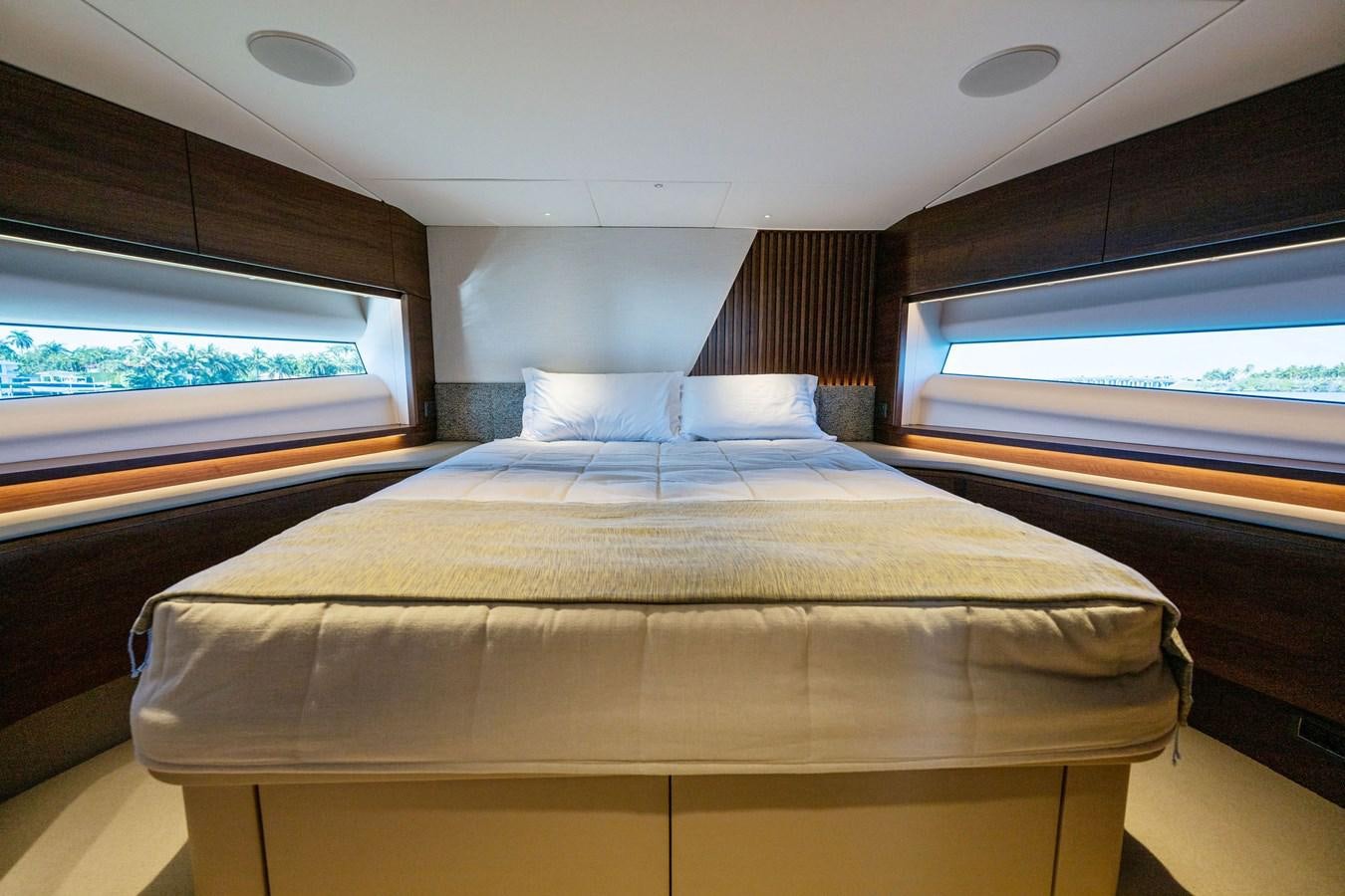a bed with a white sheet aboard ELIZABETH Yacht for Sale