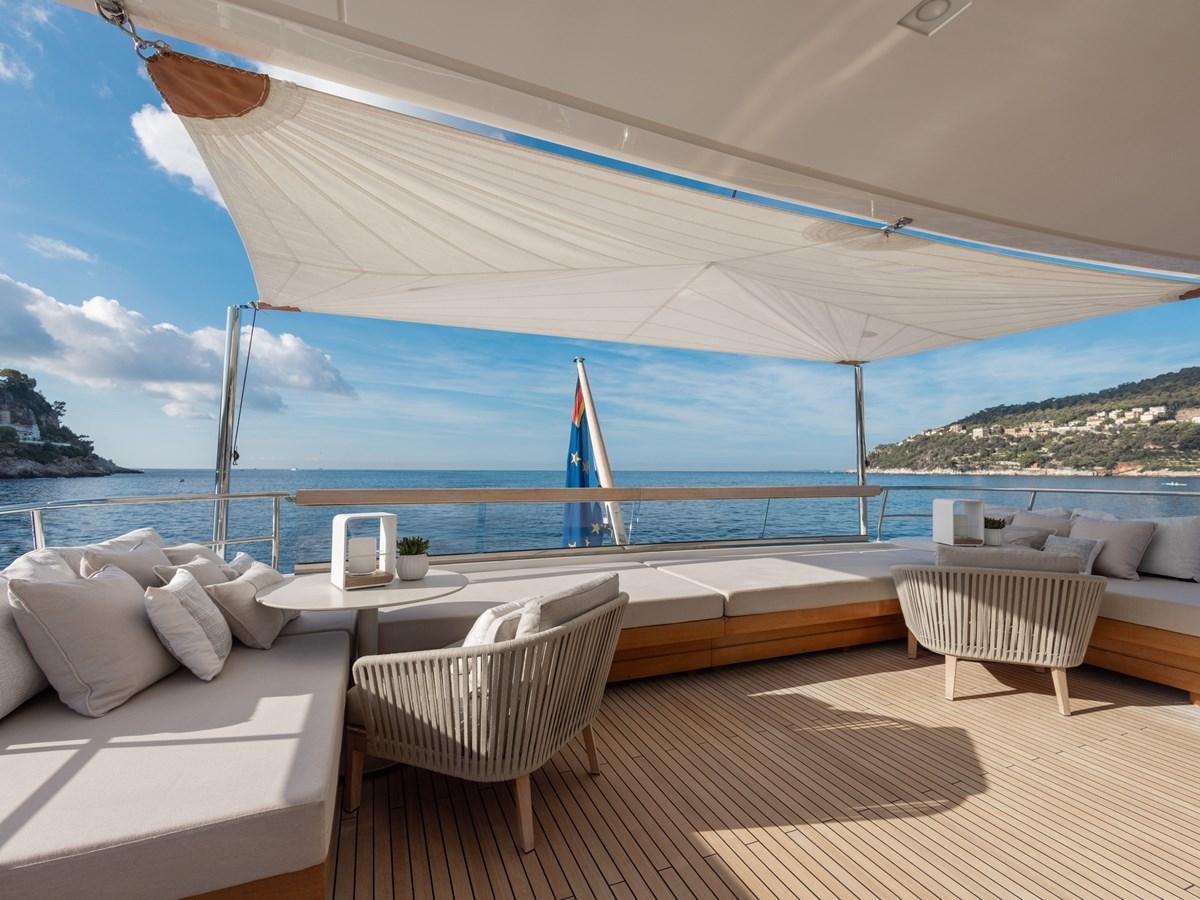 a room with a large bed and a large body of water aboard MOCEAN II Yacht for Sale