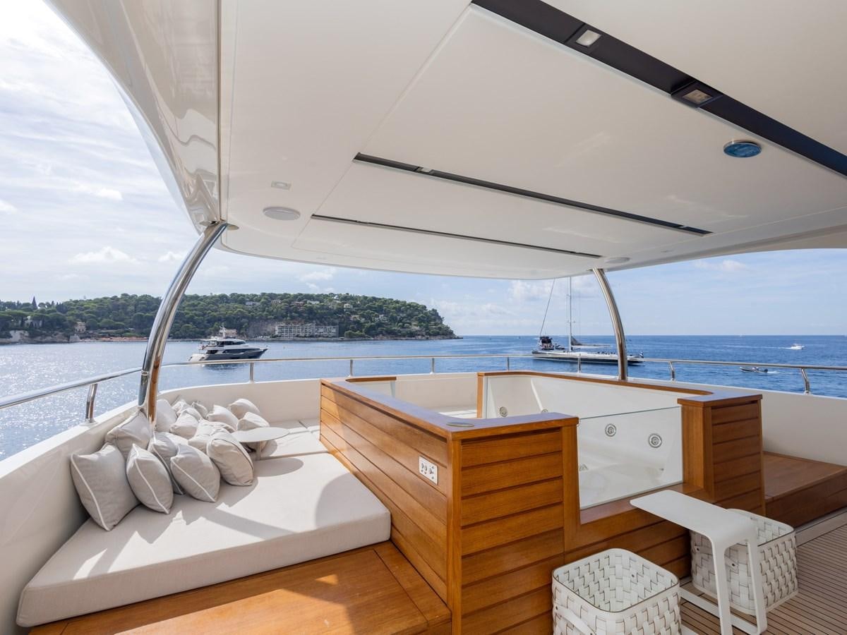 a room with a bed and a view of the ocean aboard MOCEAN II Yacht for Sale