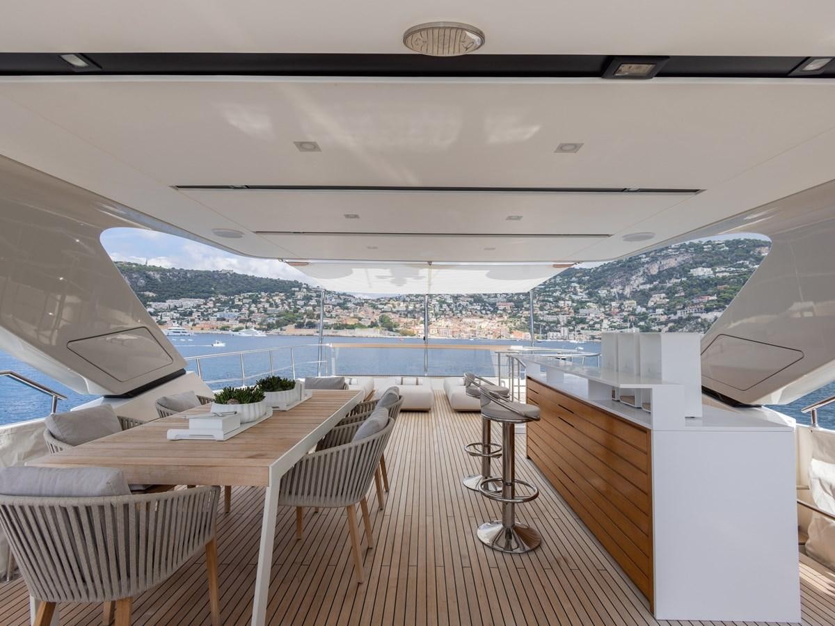 a room with a view of a city and water aboard MOCEAN II Yacht for Sale