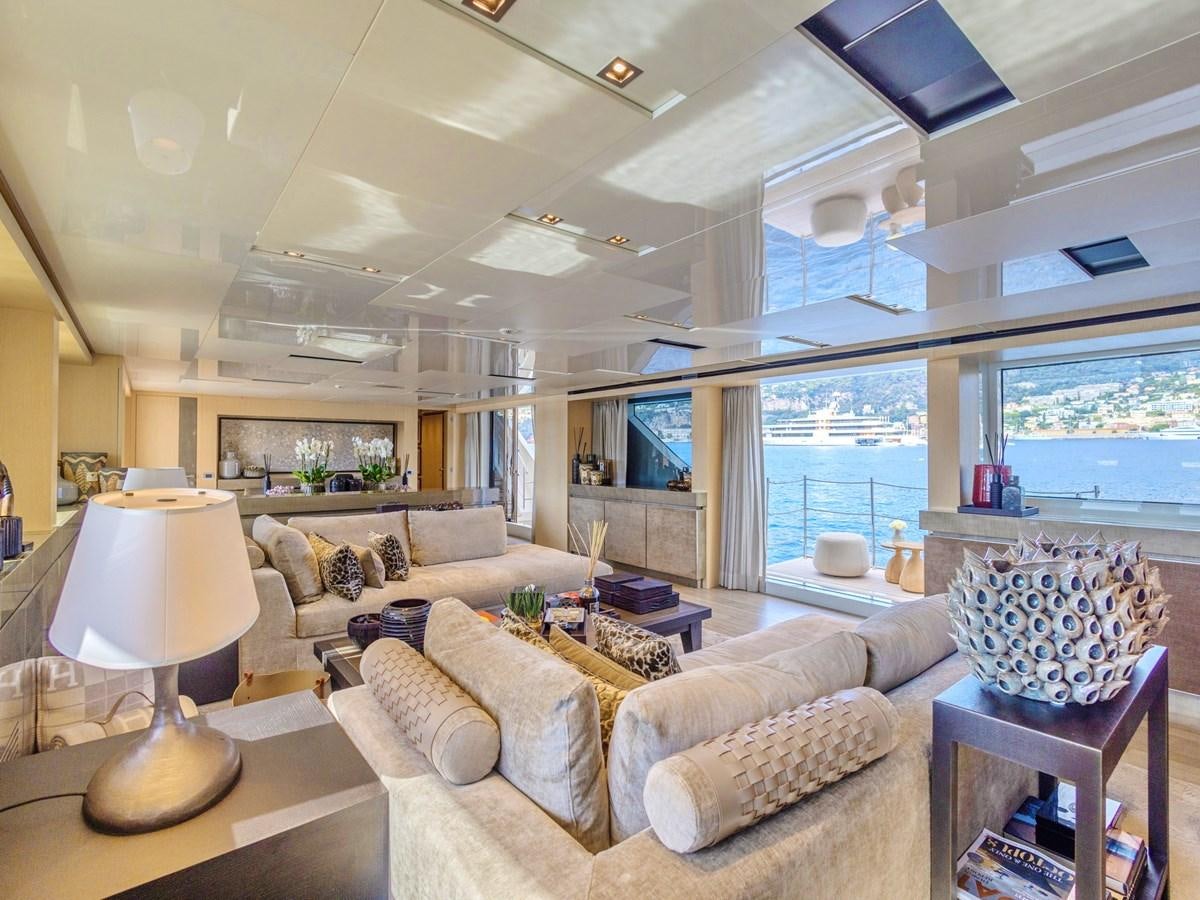 a living room with a large window aboard MOCEAN II Yacht for Sale