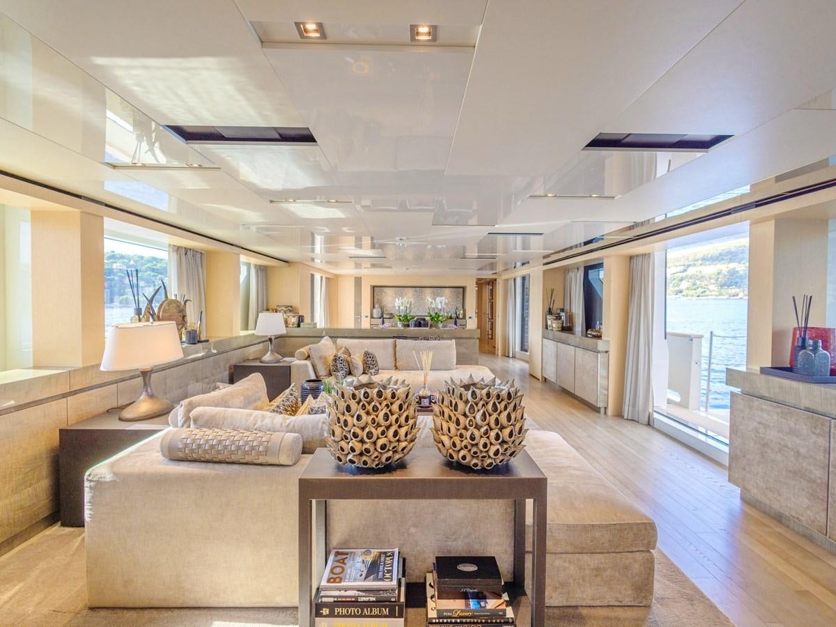 a living room with a fireplace aboard MOCEAN II Yacht for Sale