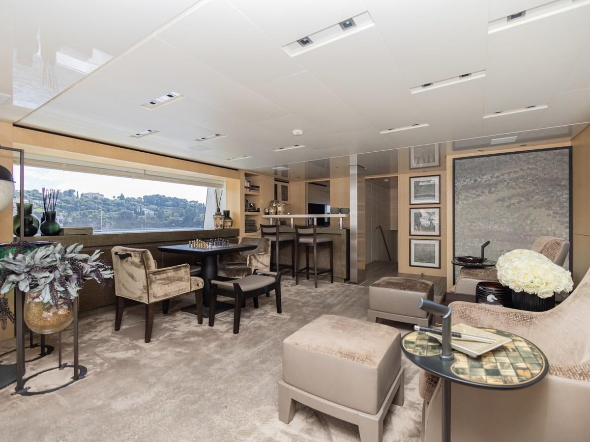 a living room with a large window aboard MOCEAN II Yacht for Sale