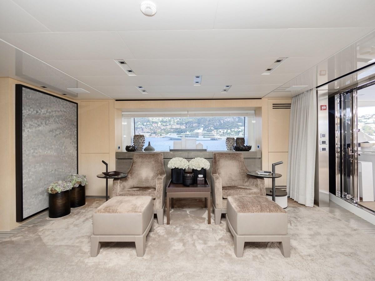 a living room with a large window aboard MOCEAN II Yacht for Sale
