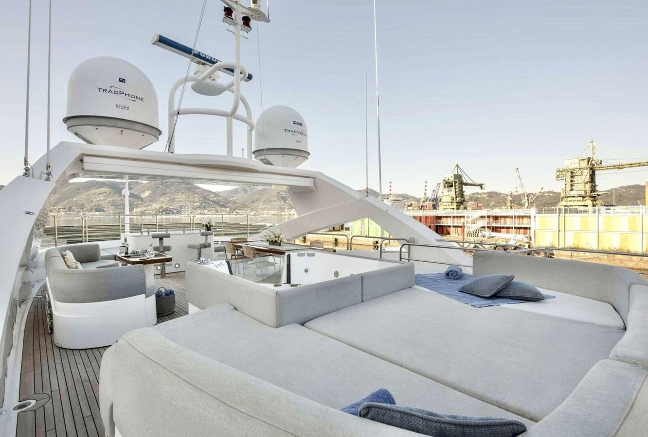 a large white boat with a large white boat on it aboard SUNSEEKER 131 2012 40 M Yacht for Sale