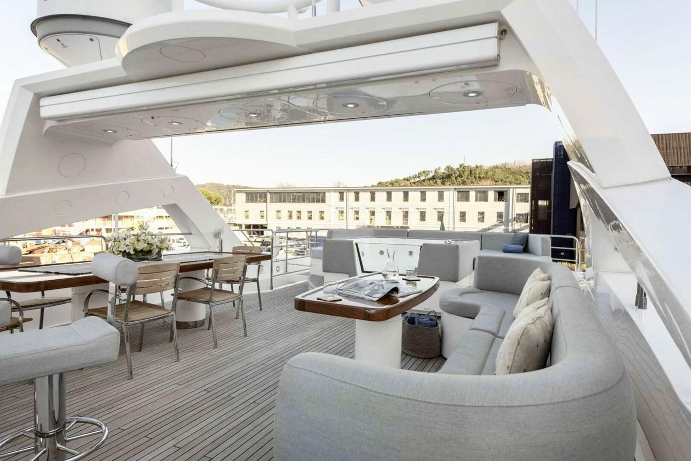 a room with a couch and a table and a large white tent aboard SUNSEEKER 131 2012 40 M Yacht for Sale