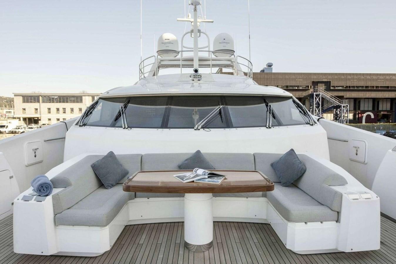 a white boat on a deck aboard SUNSEEKER 131 2012 40 M Yacht for Sale