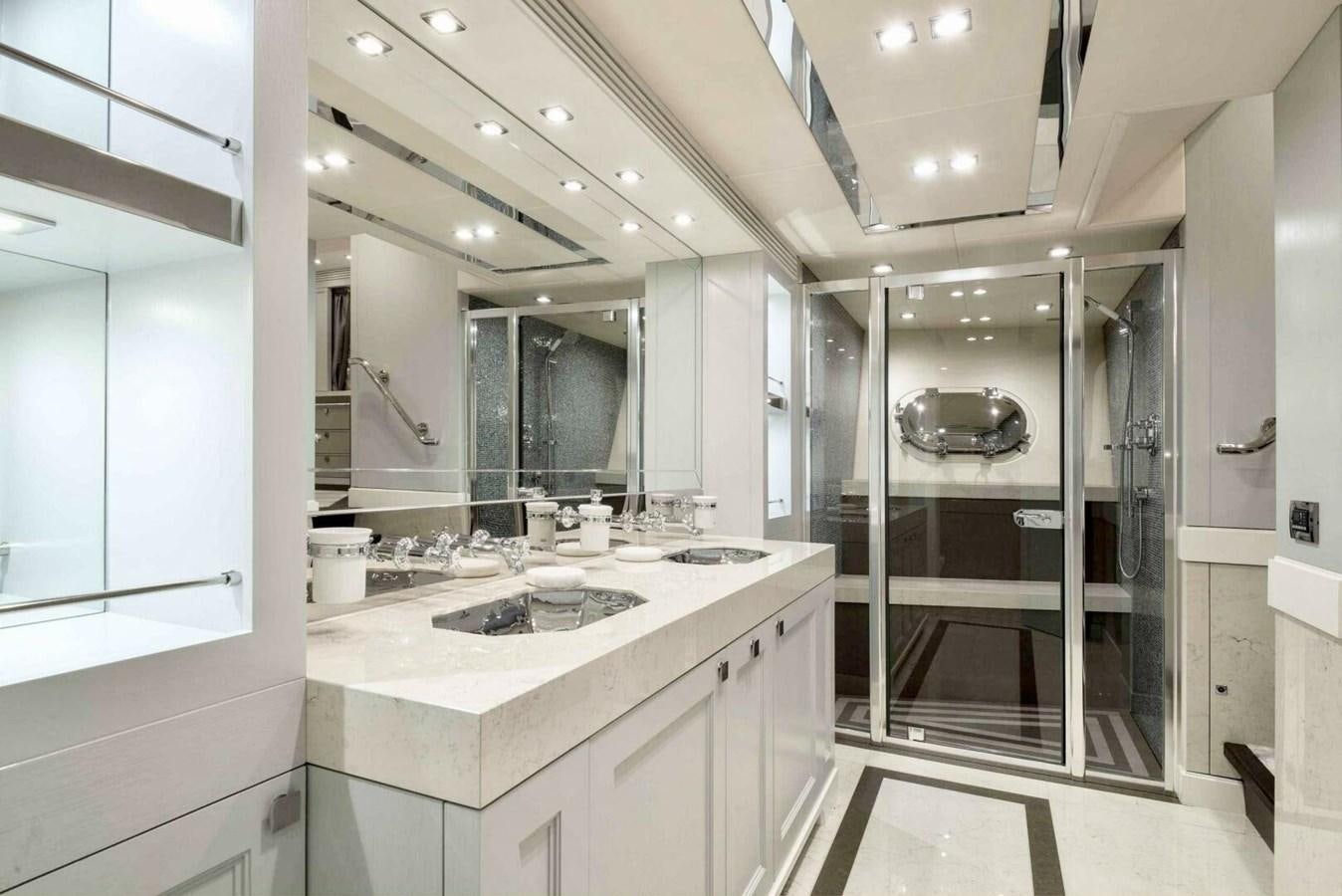 a bathroom with a sink and a mirror aboard SUNSEEKER 131 2012 40 M Yacht for Sale